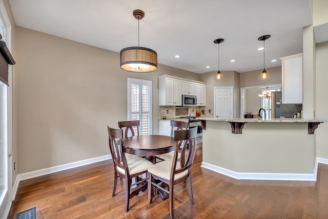 808 Seven Points Cv, Hermitage, TN 37076 - dining space featuring sink and dark wood-type flooring
