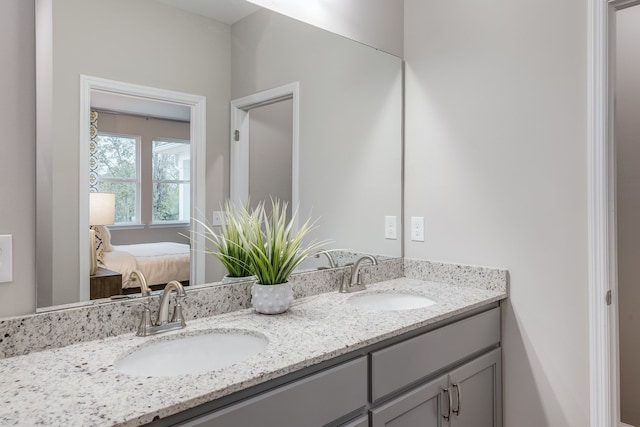 bathroom with double vanity