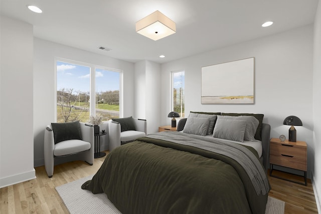 bedroom with light wood-type flooring