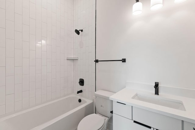 full bathroom featuring toilet, vanity, and tiled shower / bath combo