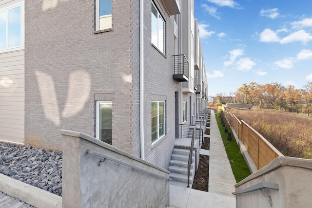 1016 W Trinity Ln Unit 1, Nashville, TN 37218 - view of side of home with brick siding and a balcony