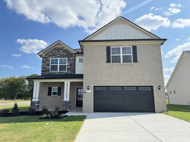 craftsman-style house with a front yard and a garage