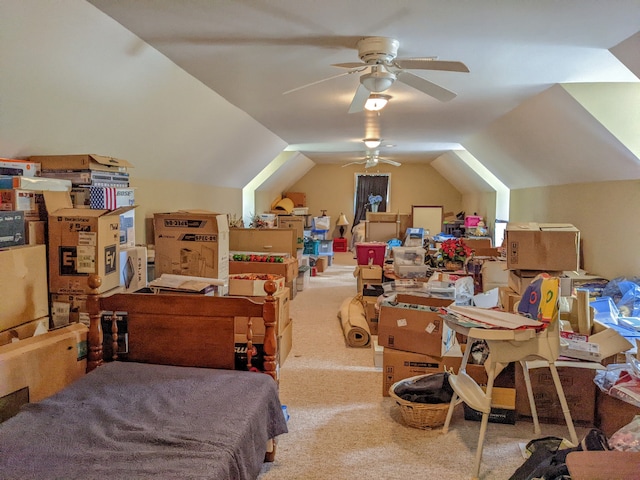 carpeted bedroom featuring lofted ceiling