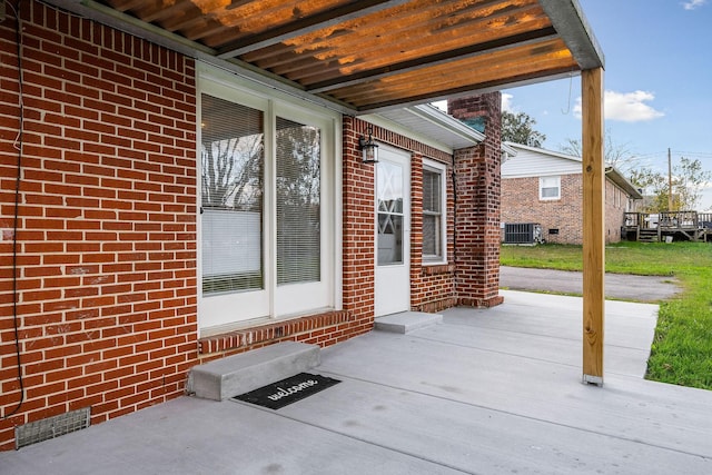 view of patio with central AC unit