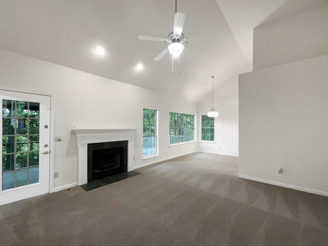 824 N Woodstone Ln, Nashville, TN 37211 - unfurnished living room featuring carpet, a fireplace with flush hearth, a ceiling fan, baseboards, and high vaulted ceiling