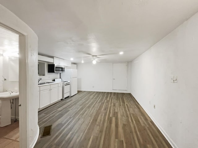 824 N Woodstone Ln, Nashville, TN 37211 - unfurnished living room featuring a ceiling fan, wood finished floors, baseboards, a sink, and recessed lighting