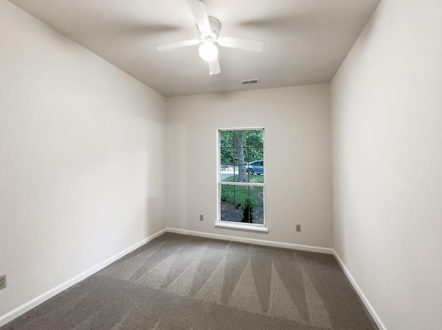824 N Woodstone Ln, Nashville, TN 37211 - empty room featuring a ceiling fan, baseboards, and dark carpet