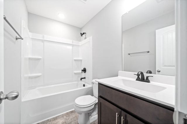 full bathroom featuring shower / bathing tub combination, vanity, toilet, and tile patterned flooring