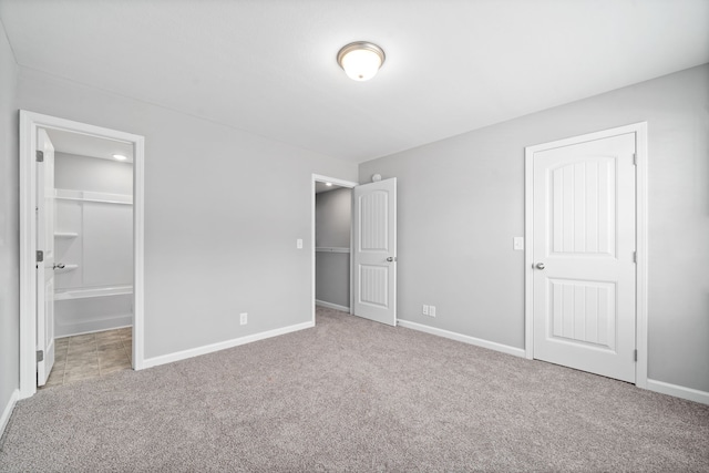 unfurnished bedroom featuring carpet flooring