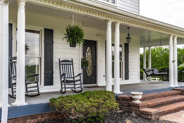 property entrance with a porch