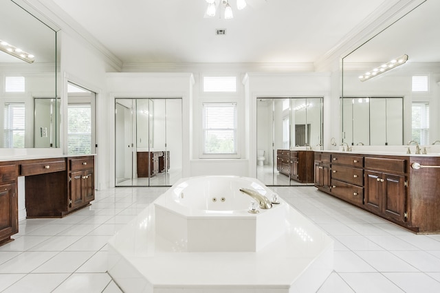 bathroom with vanity, crown molding, tile patterned floors, and shower with separate bathtub