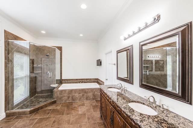 bathroom featuring independent shower and bath, crown molding, and vanity