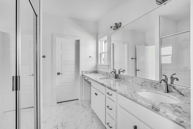 bathroom featuring double sink, a shower with door, tile floors, and large vanity