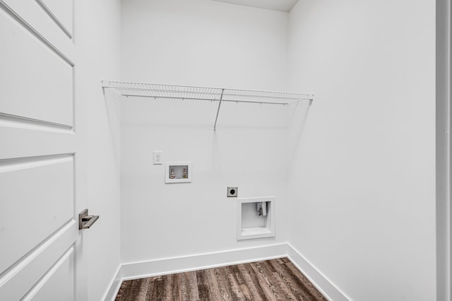 washroom featuring hookup for an electric dryer, hardwood / wood-style flooring, and washer hookup