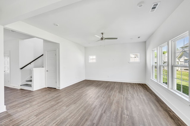 interior space featuring wood-type flooring and ceiling fan