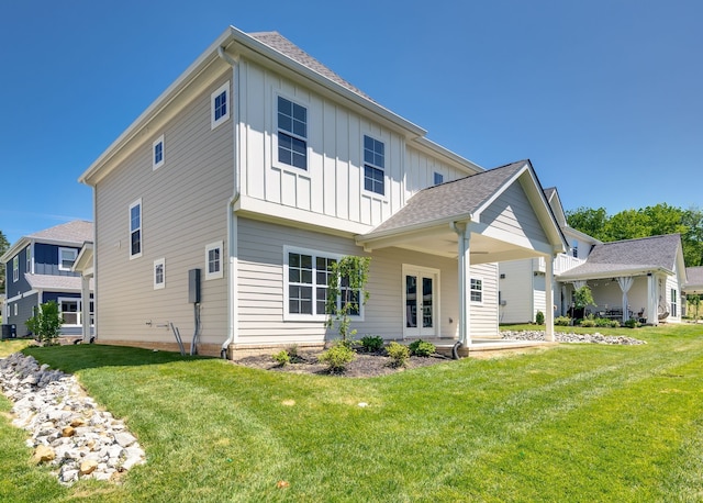 exterior space featuring a yard and central AC unit