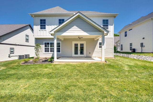 back of property featuring a patio area, ceiling fan, a yard, and central air condition unit