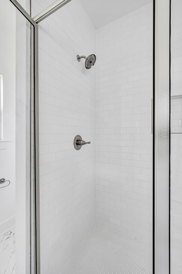 bathroom featuring walk in shower