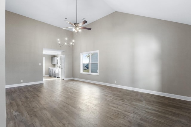 unfurnished living room featuring ceiling fan with notable chandelier, high vaulted ceiling, and dark hardwood / wood-style floors