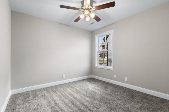 unfurnished room with carpet flooring and ceiling fan