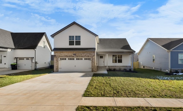 view of front of property with brick siding, a garage, concrete driveway, and a front lawn