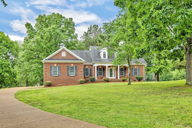 view of front facade with a front lawn