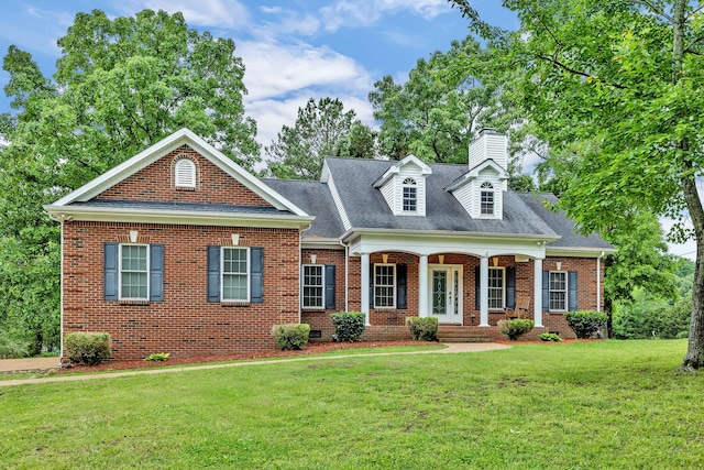 view of front facade with covered porch and a front lawn