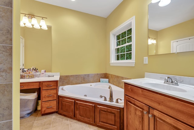 bathroom with vanity, tile floors, and a bathing tub