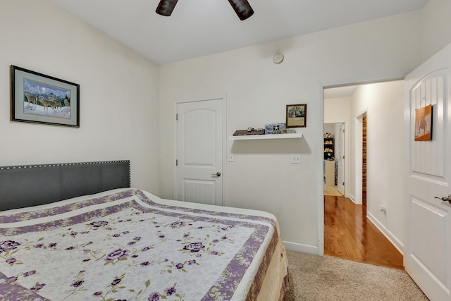 bedroom with ceiling fan and carpet