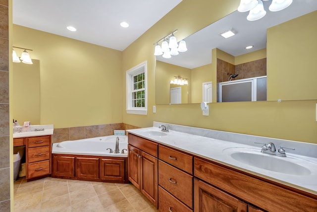 bathroom with tile flooring, independent shower and bath, and dual bowl vanity