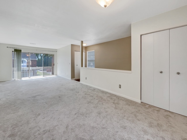 interior space with carpet flooring and access to outside