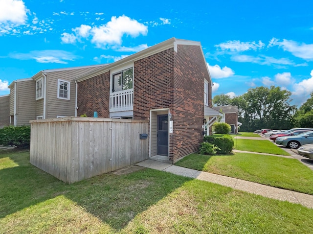 view of property exterior featuring a yard