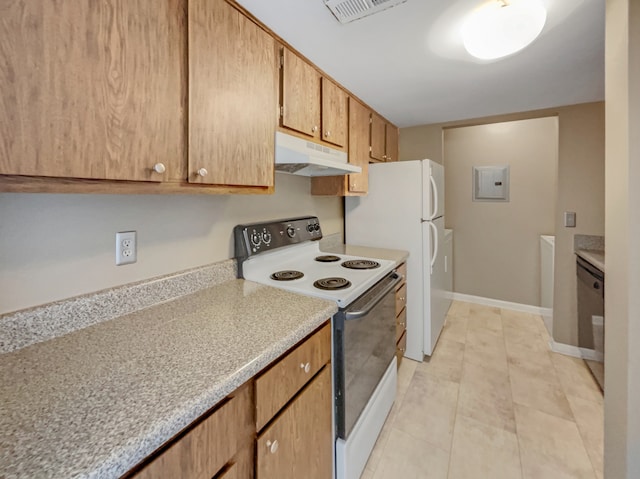 kitchen with white appliances and light tile floors