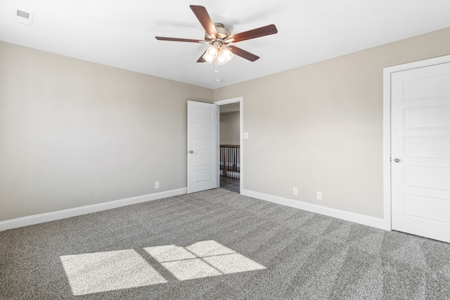 unfurnished bedroom featuring carpet and ceiling fan