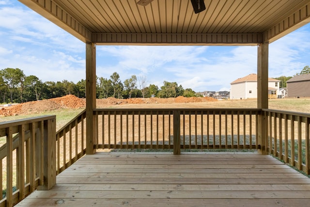 wooden deck with ceiling fan