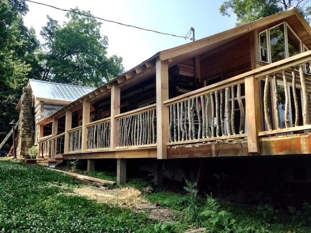 rear view of house with metal roof