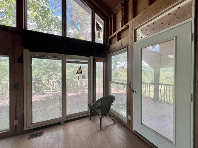 sunroom featuring visible vents