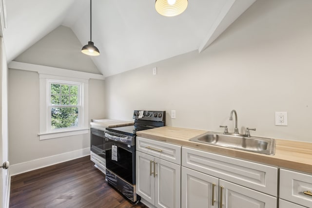 kitchen with black range with electric stovetop, vaulted ceiling, decorative light fixtures, and wood counters