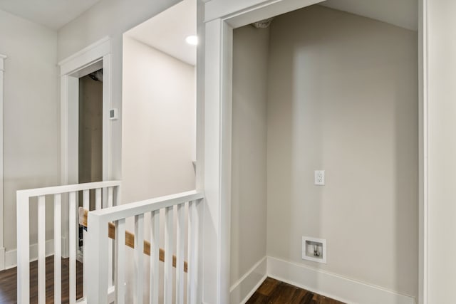 corridor featuring dark hardwood / wood-style flooring