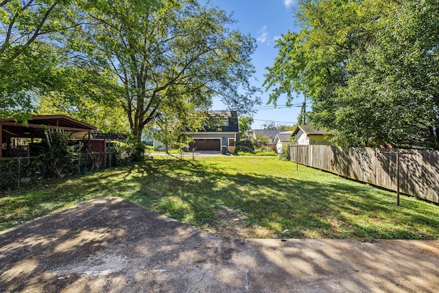 view of yard featuring a garage