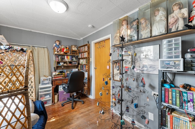 office space featuring ornamental molding and hardwood / wood-style floors