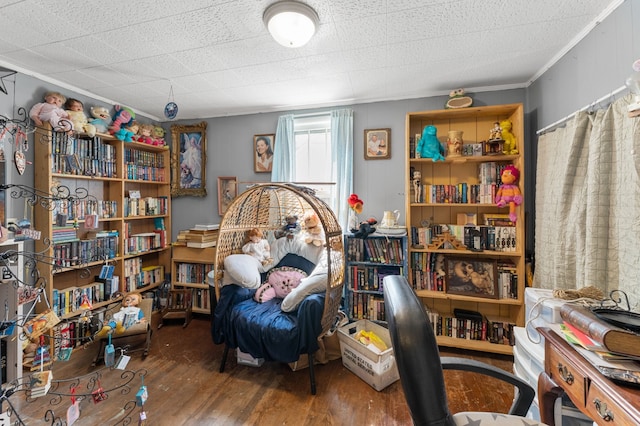 office space featuring ornamental molding and hardwood / wood-style floors