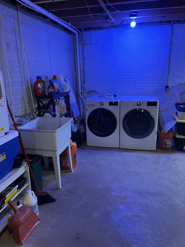 washroom with separate washer and dryer