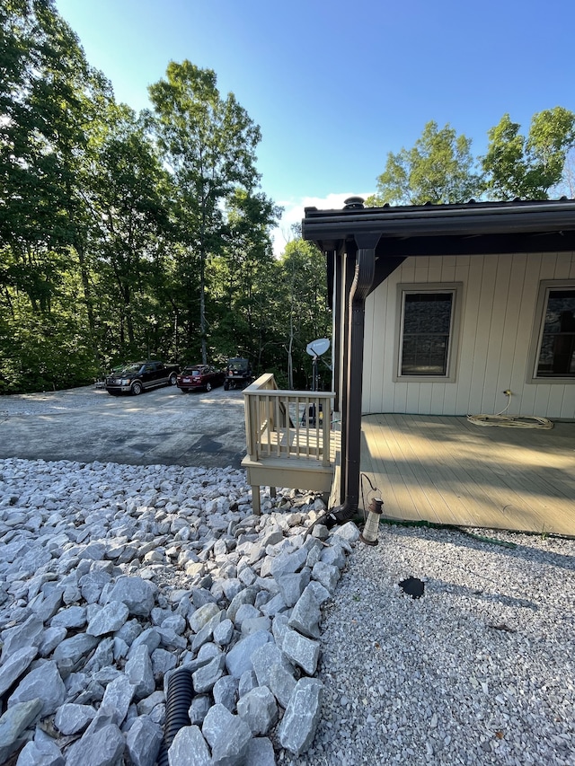 view of side of property featuring a deck