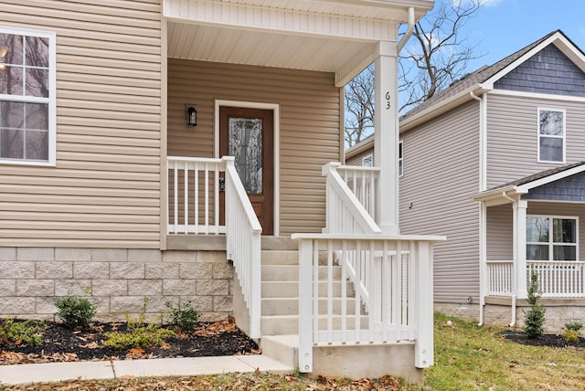 entrance to property with covered porch