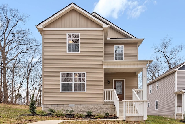 traditional-style house featuring crawl space and a porch