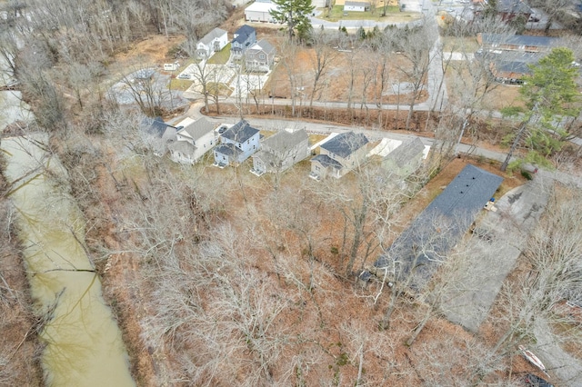 birds eye view of property with a residential view