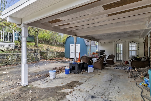 view of patio with a shed