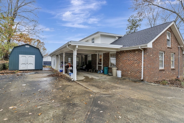 view of home's exterior featuring a storage shed