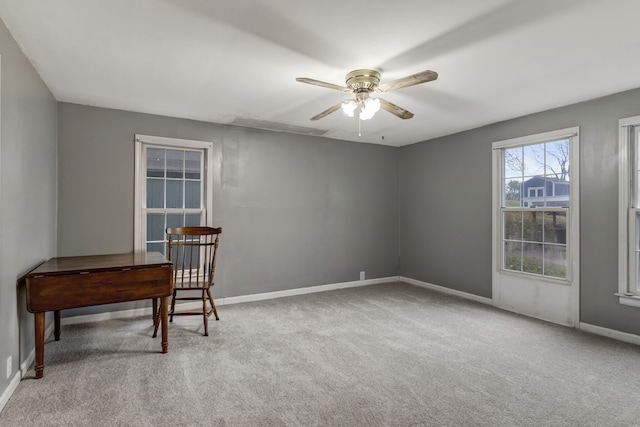 office featuring carpet and ceiling fan